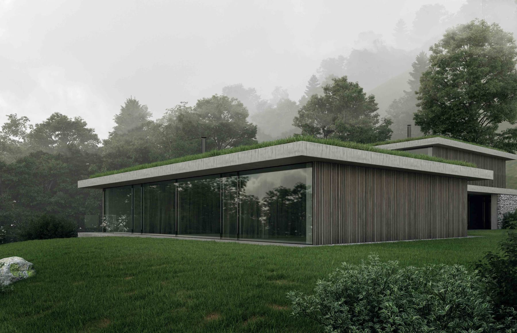 Contemporary residential project with glass facade in natural landscape